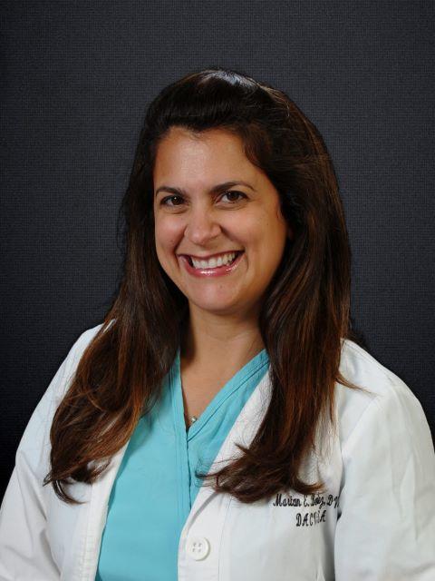 Dr. Marian Benitez, VISITING VETERINARIAN, SURGEON at Queen City Animal Hospital